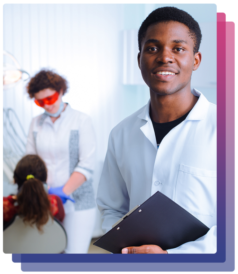 Dental instructor in a hands-on training environment